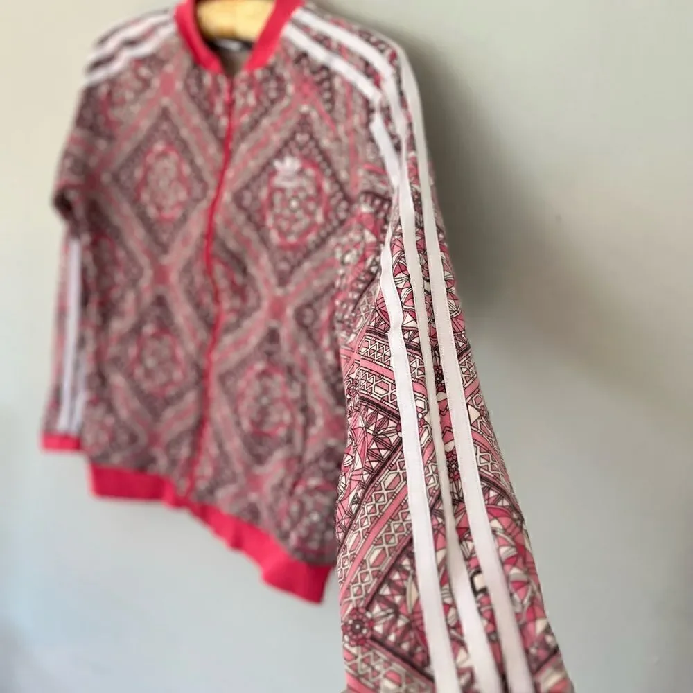 Adidas | pink busy patterned zip up jacket girls